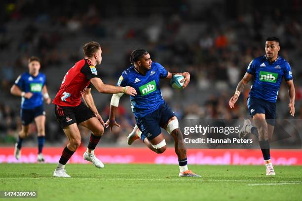 Hoskins Sotutu of the Blues makes a break during the round four Super Rugby Pacific match between Blues and Crusaders at Eden Park, on March 18 in...