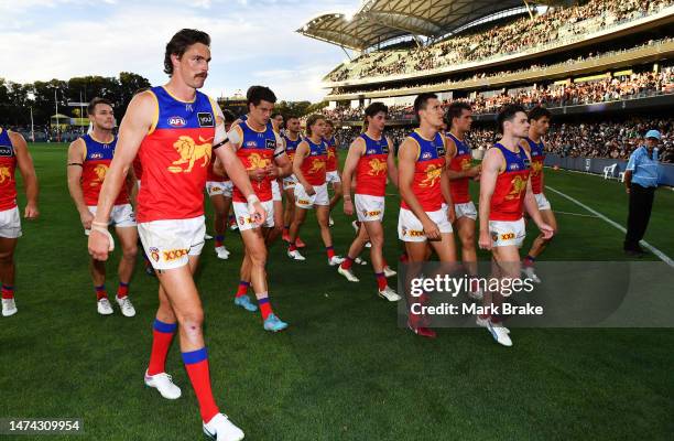 Joe Daniher of the Lions ;lead his team off after the round one AFL match between Port Adelaide Power and Brisbane Lions at Adelaide Oval, on March...