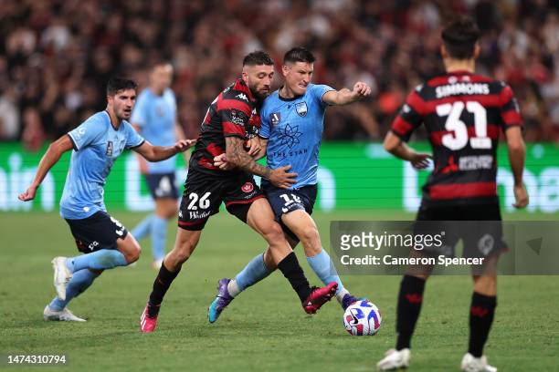 Brandon Borrello of the Wanderers and Joe Lolley of Sydney FC contest the ball during the round 21 A-League Men's match between Sydney FC and Western...