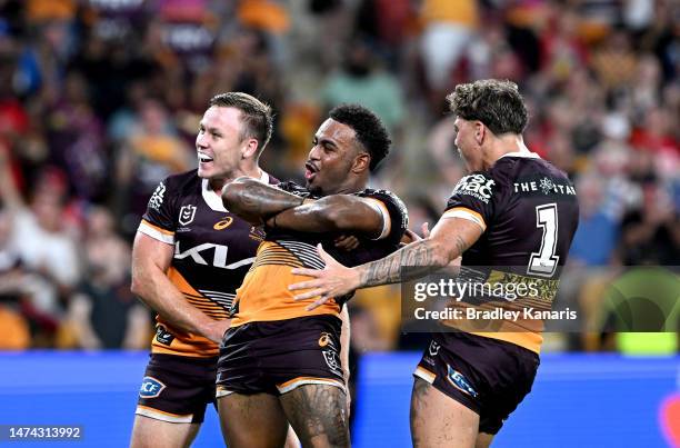 Ezra Mam of the Broncos celebrates scoring a try during the round three NRL match between Brisbane Broncos and St George Illawarra Dragons at Suncorp...