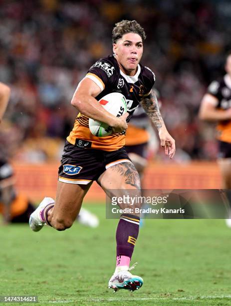 Reece Walsh of the Broncos breaks away from the defence during the round three NRL match between Brisbane Broncos and St George Illawarra Dragons at...