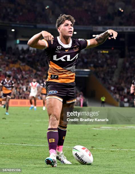 Reece Walsh of the Broncos celebrates scoring a try during the round three NRL match between Brisbane Broncos and St George Illawarra Dragons at...
