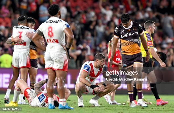 Zac Lomax of the Dragons looks dejected after his team loses the round three NRL match between Brisbane Broncos and St George Illawarra Dragons at...