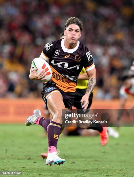 Reece Walsh of the Broncos breaks away from the defence during the round three NRL match between Brisbane Broncos and St George Illawarra Dragons at...