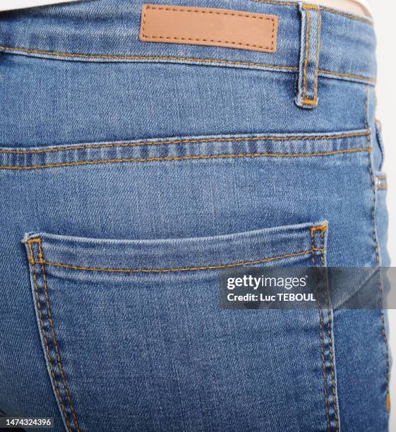 back pocket of jeans - jeans stock pictures, royalty-free photos & images