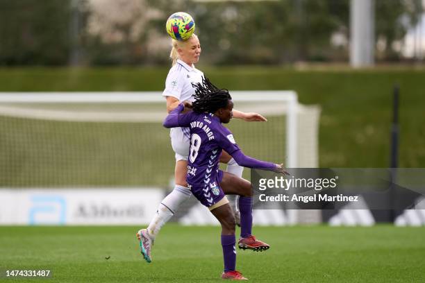 Sofie Svava of Real Madrid competes for the ball with Koko Ange N'Guessan of UDG Tenerife during the Liga F match between Real Madrid and UDG...