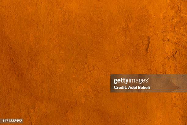 orange wall texture - plastering stock pictures, royalty-free photos & images