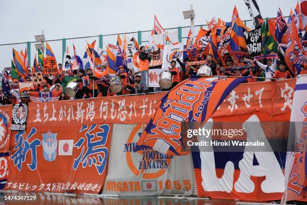 Fans of Albirex Niigata cheer prior to the J.LEAGUE Meiji Yasuda J1 5th Sec. Match between Urawa Red Diamonds and Albirex Niigata Urawa Komaba...