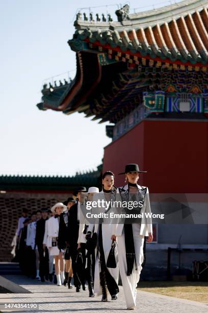 Models showcase designs on the runway at the Heaven Gaia show by Chinese designer Xiong Ying during Intangible Cultural Heritage Shangxin Show on...