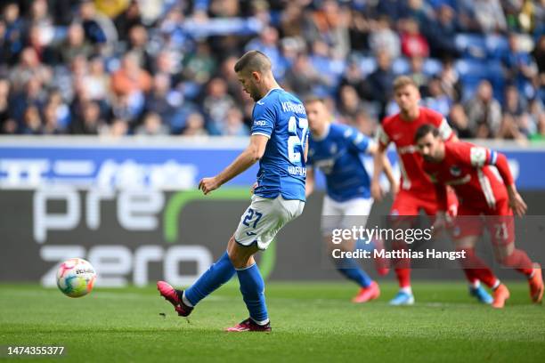 Andrej Kramaric of TSG Hoffenheim scores the team's first goal from a penalty kick during the Bundesliga match between TSG Hoffenheim and Hertha BSC...