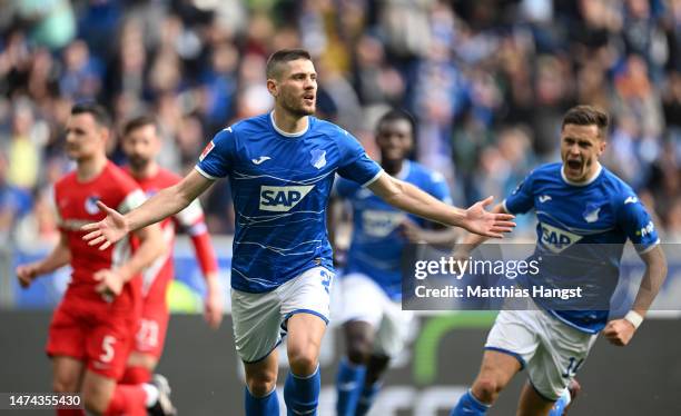 Andrej Kramaric of TSG Hoffenheim celebrates after scoring the team's first goal from a penalty kick during the Bundesliga match between TSG...