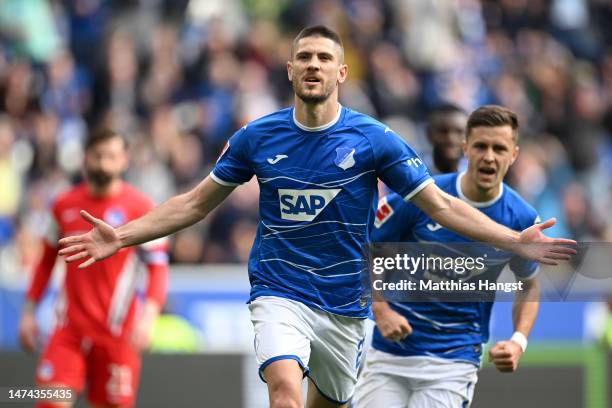 Andrej Kramaric of TSG Hoffenheim celebrates after scoring the team's first goal from a penalty kick during the Bundesliga match between TSG...