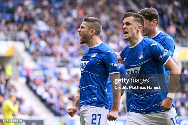 Andrej Kramaric of TSG Hoffenheim celebrates after scoring the team's first goal from a penalty kick during the Bundesliga match between TSG...