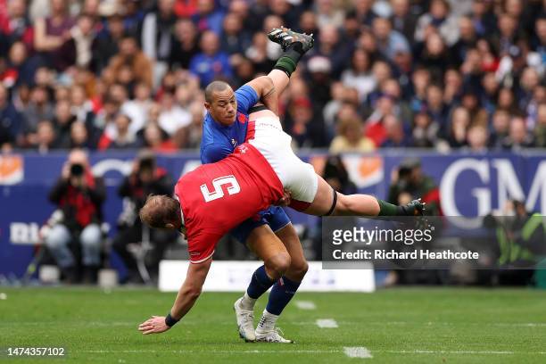Gael Fickou of France tackles Alun Wyn Jones of Wales, before a penalty is awarded, during the Six Nations Rugby match between France and Wales at...