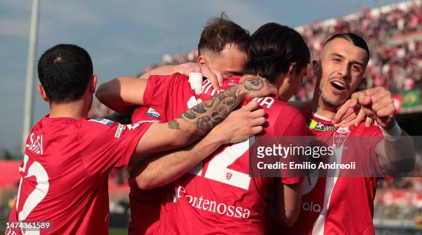 Carlos Augusto of AC Monza celebrates with his teammates after scoring the team's first goal during the Serie A match between AC Monza and US...