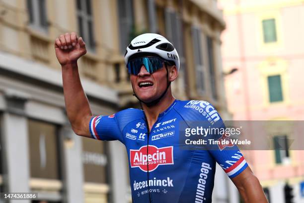 Mathieu Van Der Poel of The Netherlands and Team Alpecin-Deceuninck celebrates at finish line as race winner during the 114th Milano-Sanremo 2023 a...