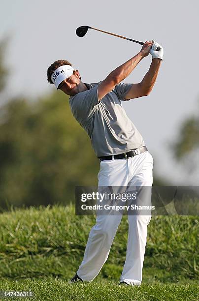 Michael Letzig watches his tee shot on the eighth hole during the second round of the Web.com Tour United Leasing Championship at the Victoria...