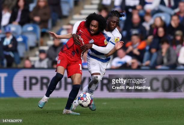 Osman Kakay of Queens Park Rangers and Tahith Chong of Birmingham City battle for the ball during the Sky Bet Championship match between Queens Park...