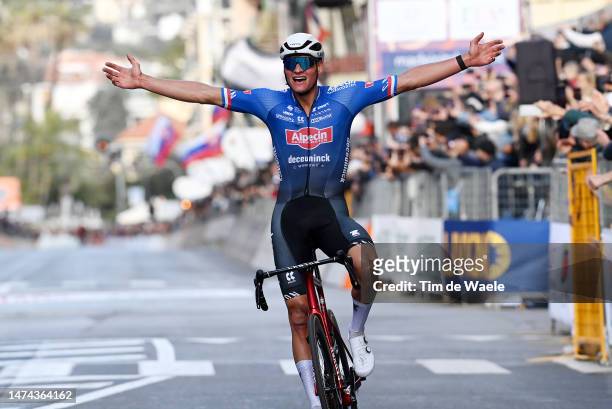 Mathieu Van Der Poel of The Netherlands and Team Alpecin-Deceuninck celebrates at finish line as race winner during the 114th Milano-Sanremo 2023 a...