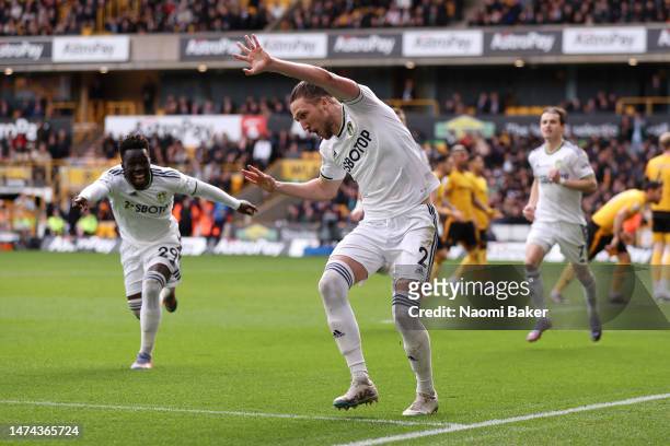 Luke Ayling of Leeds United celebrates after scoring the team's second goal during the Premier League match between Wolverhampton Wanderers and Leeds...