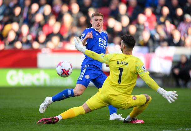 Harvey Barnes of Leicester City scores the team's first goal past David Raya of Brentford during the Premier League match between Brentford FC and...
