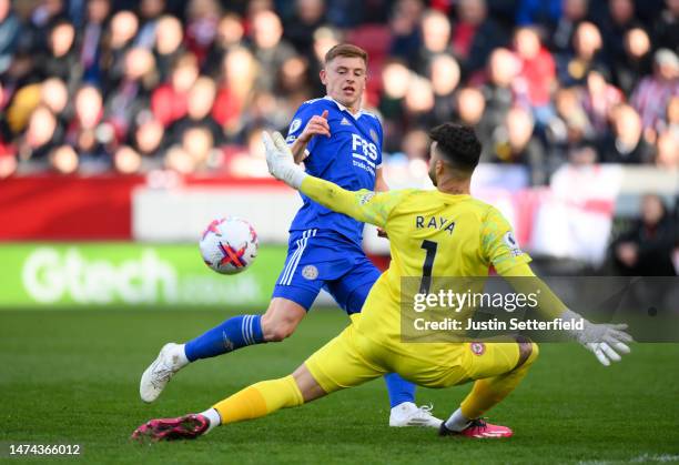 Harvey Barnes of Leicester City scores the team's first goal past David Raya of Brentford during the Premier League match between Brentford FC and...