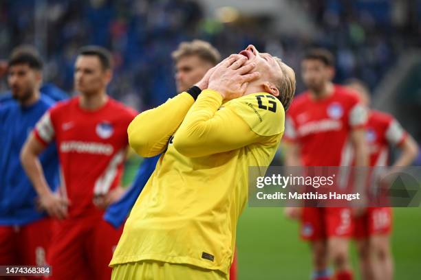 Oliver Christensen of Hertha Berlin reacts after the Bundesliga match between TSG Hoffenheim and Hertha BSC at PreZero-Arena on March 18, 2023 in...