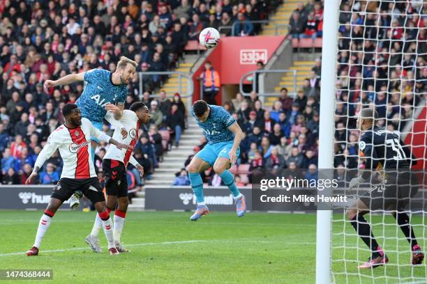Harry Kane of Tottenham Hotspur scores the team's second goal past Gavin Bazunu of Southampton during the Premier League match between Southampton FC...