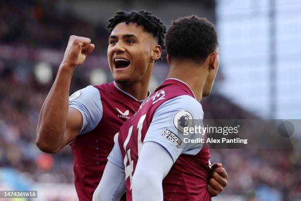 Jacob Ramsey of Aston Villa celebrates after scoring the team's second goal with teammate Ollie Watkins during the Premier League match between Aston...