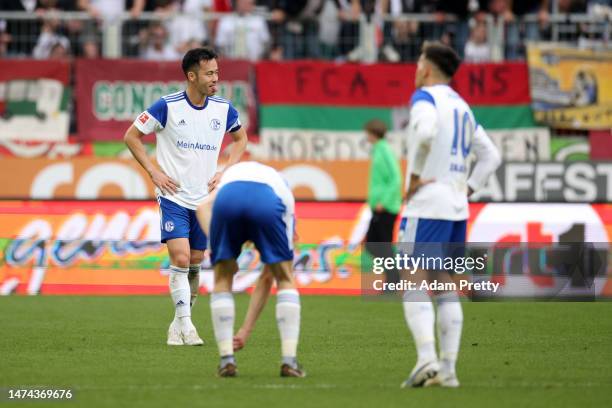 Maya Yoshida of FC Schalke 04 looks dejected following the Bundesliga match between FC Augsburg and FC Schalke 04 at WWK-Arena on March 18, 2023 in...