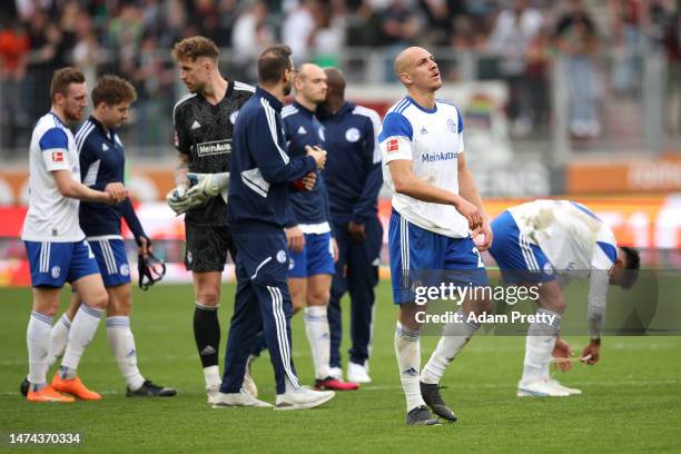 Michael Frey of FC Schalke 04 looks dejected following the Bundesliga match between FC Augsburg and FC Schalke 04 at WWK-Arena on March 18, 2023 in...