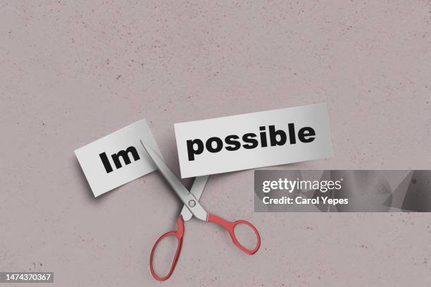 scissors cutting paper with impossible text - possible stock pictures, royalty-free photos & images