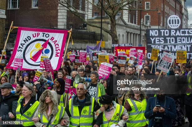 The Resist Racism demonstration proceeds from Portland place to Downing street on March 18, 2023 in London, England. The annual Stand Up to Racism...