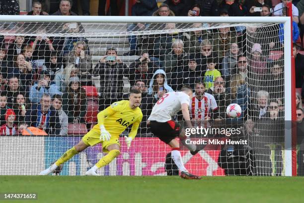 James Ward-Prowse of Southampton scores the team's third goal past Fraser Forster of Tottenham Hotspur from a penalty kick during the Premier League...