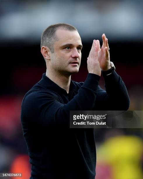 Manager of Wigan Athletic, Shaun Maloney applauds the fans during the Sky Bet Championship between Watford and Wigan Athletic at Vicarage Road on...