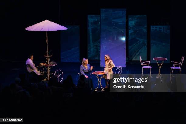 three theater actors entertain the audience during a theater performance - backstage audience stock pictures, royalty-free photos & images