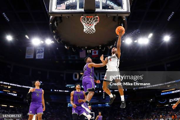 Lamont Butler of the San Diego State Aztecs attempts a layup against the Furman Paladins during the second half in the second round of the NCAA Men's...