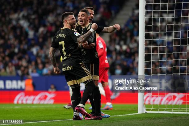 Iago Aspas of RC Celta celebrates with teammates Carles Perez and Haris Seferovic after scoring the team's second goal during the LaLiga Santander...