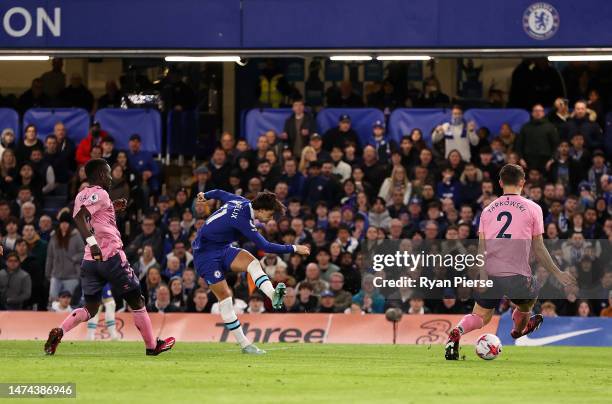 Joao Felix of Chelsea scores the team's first goal during the Premier League match between Chelsea FC and Everton FC at Stamford Bridge on March 18,...