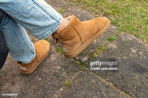 close-up photo of a pair of brown suede shoes - suede boot stock pictures, royalty-free photos & images