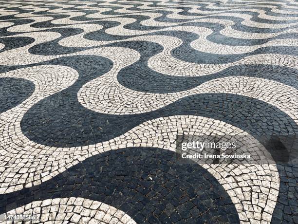 stone mosaic on the street - portuguese culture fotografías e imágenes de stock