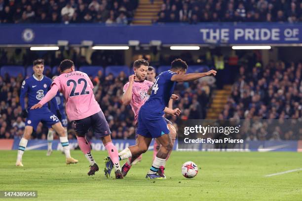 Reece James of Chelsea is fouled by Ben Godfrey of Everton, which leads to a penalty, during the Premier League match between Chelsea FC and Everton...