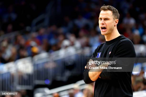 Head coach Jon Scheyer of the Duke Blue Devils looks on against the Tennessee Volunteers during the first half in the second round of the NCAA Men's...