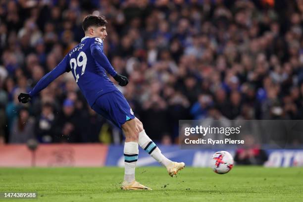 Kai Havertz of Chelsea scores the team's second goal from a penalty kick during the Premier League match between Chelsea FC and Everton FC at...
