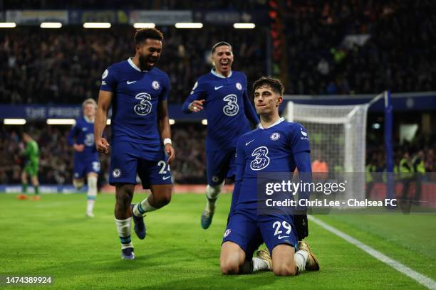 Kai Havertz of Chelsea celebrates after scoring the team's second goal from a penalty kick with teammates during the Premier League match between...