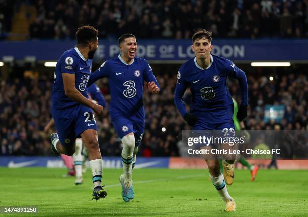 Kai Havertz of Chelsea celebrates after scoring the team's second goal from a penalty kick with teammates during the Premier League match between...