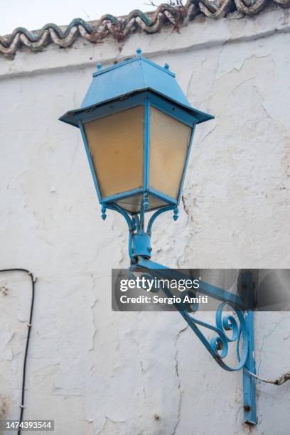 wall lantern light on whitewashed building - tunisia tunis stock pictures, royalty-free photos & images