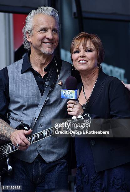 Neil Giraldo and wife Pat Benatar perform during "FOX & Friends" All American Concert Series at FOX Studios on June 29, 2012 in New York City.
