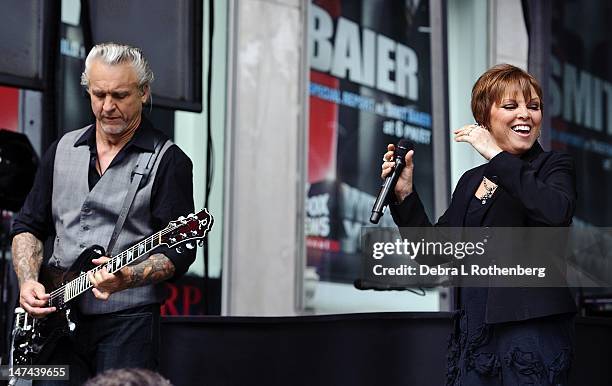 Neil Giraldo and wife Pat Benatar perform during "FOX & Friends" All American Concert Series at FOX Studios on June 29, 2012 in New York City.