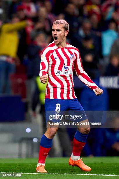 Antoine Griezmann of Atletico de Madrid celebrates after scoring his team's first goal during the LaLiga Santander match between Atletico de Madrid...